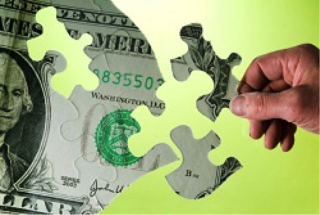 money shaped as puzzle pieces